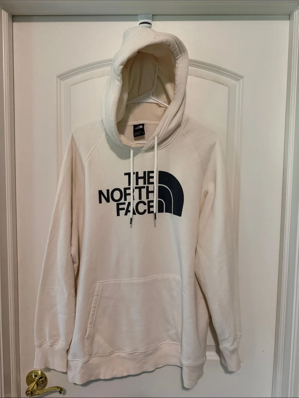 The North Face Cream Hoodie with Black Logo